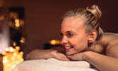 90 минути масаж "Коледна магия": Ароматерапевтичен масаж с масла от мандарина и канела на цяло тяло, плюс лифтинг масаж на лице и подарък - рефлексотерапия на стъпала