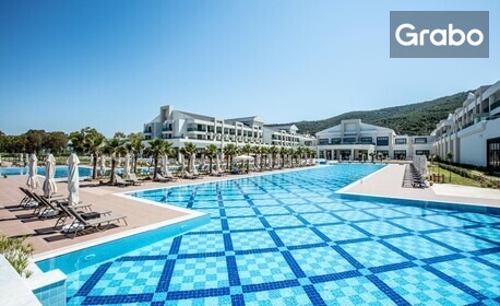 Last Minute за ранни записвания в Кушадасъ: 7 нощувки на база Ultra All Inclusive в Хотел Korumar Ephesus Beach & SPA Resort*****, плюс басейн, водна пързалка и детска анимация