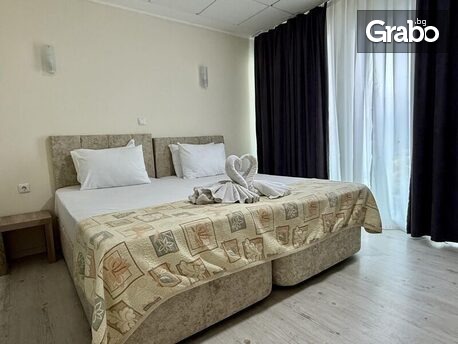 Ранна лятна почивка в Слънчев бряг: Нощувка на база All Inclusive Premium, плюс чадър и шезлонг на плажа, водна пързалка и паркинг